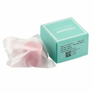 Le pessaire cube perforé avec son emballage scellé et sa boîte Le pessaire cube perforé avec son emballage scellé et sa boîte